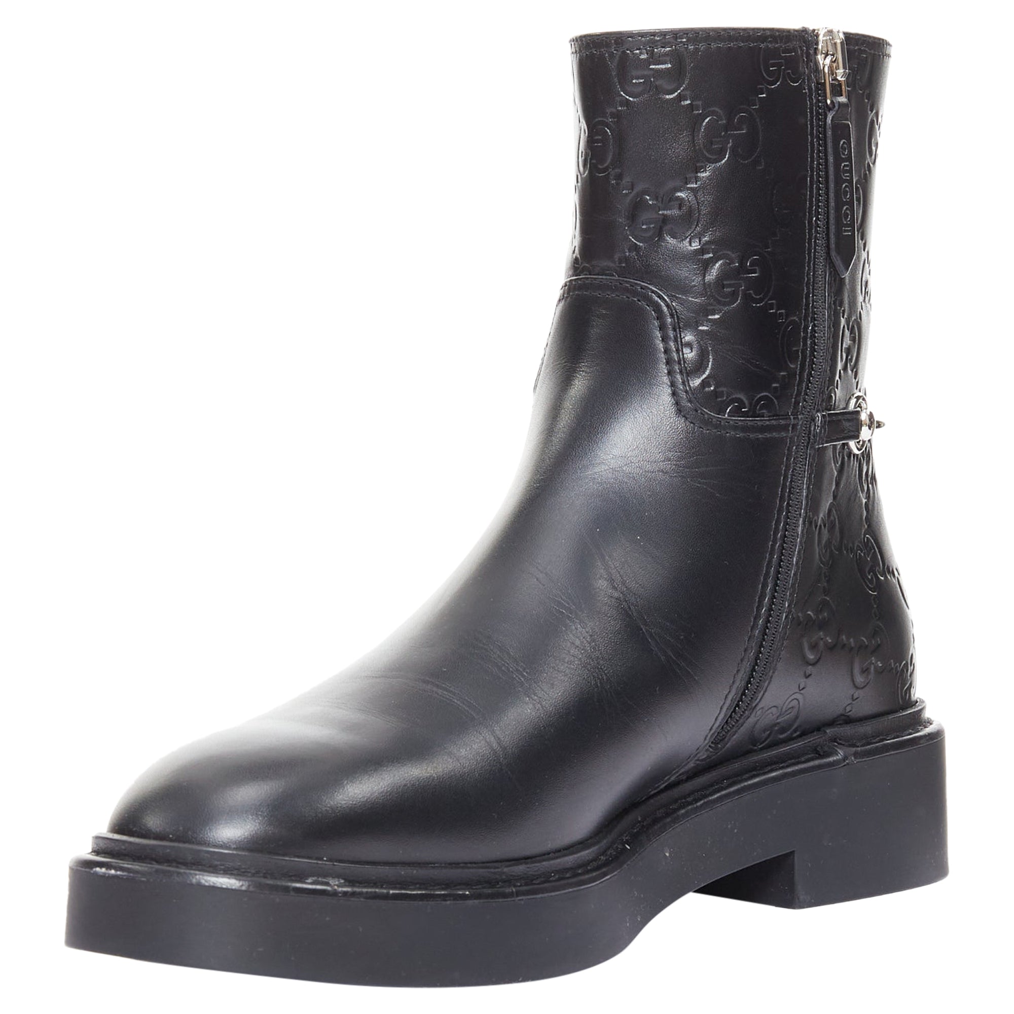 Women's Gucci black monogram ankle boots