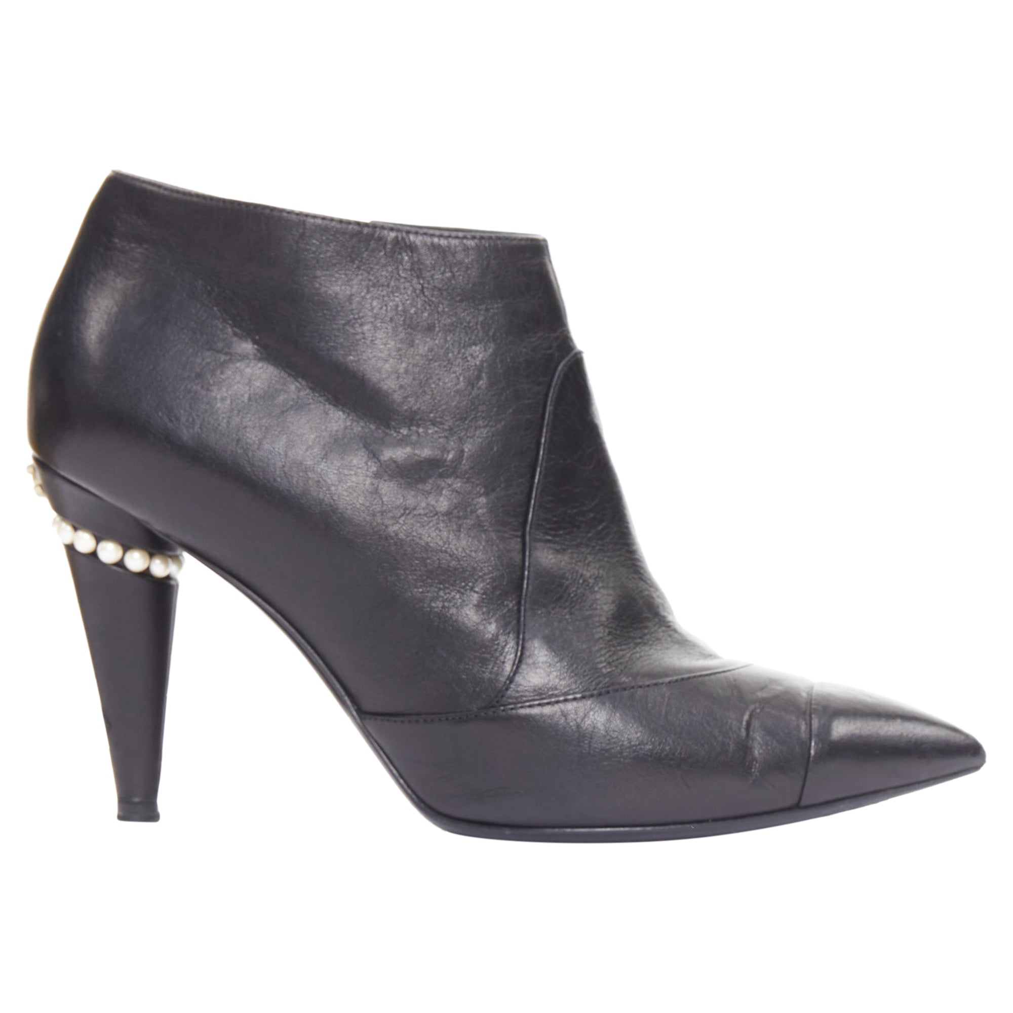 Women's Chanel black pearl ankle boots