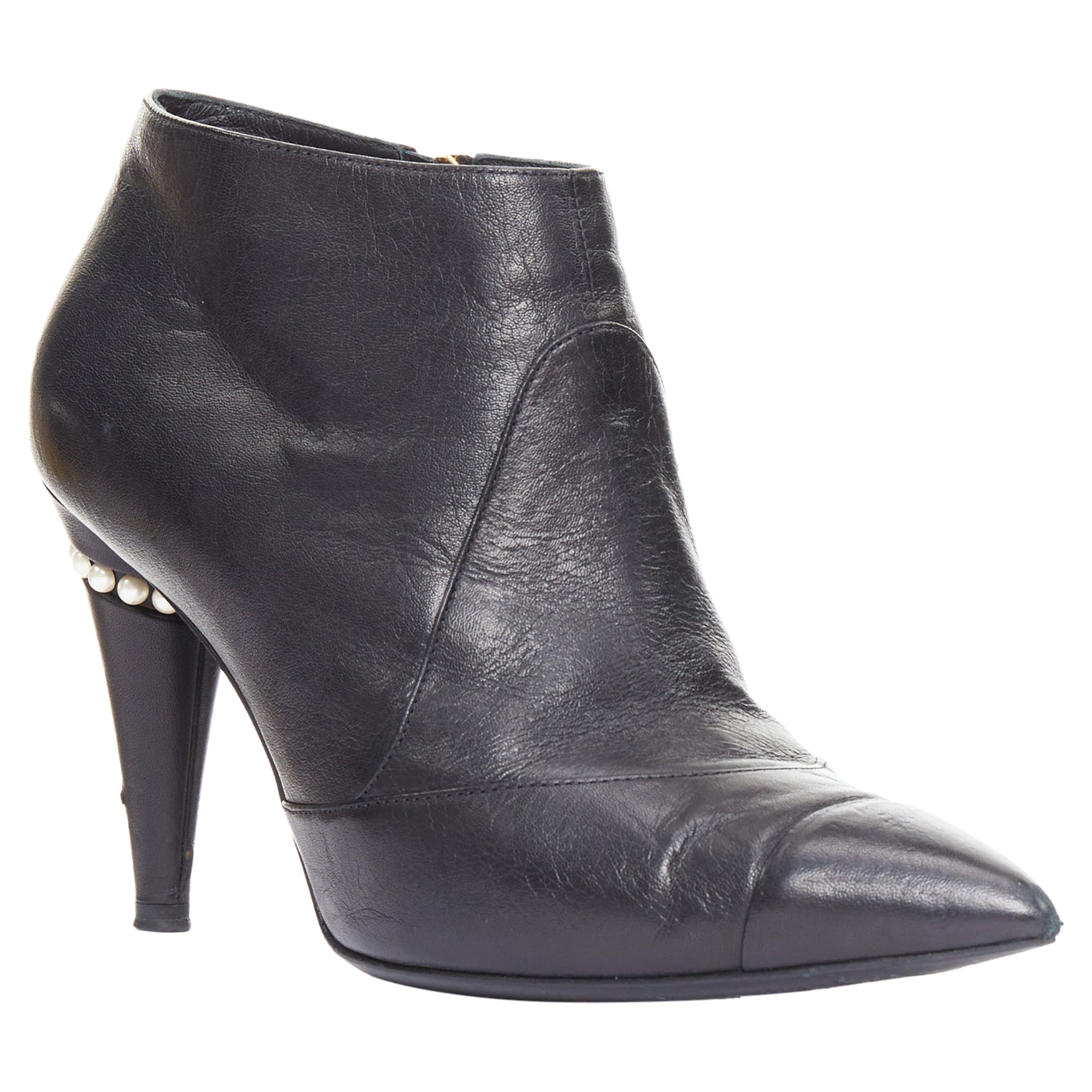 Women's Chanel black pearl ankle boots