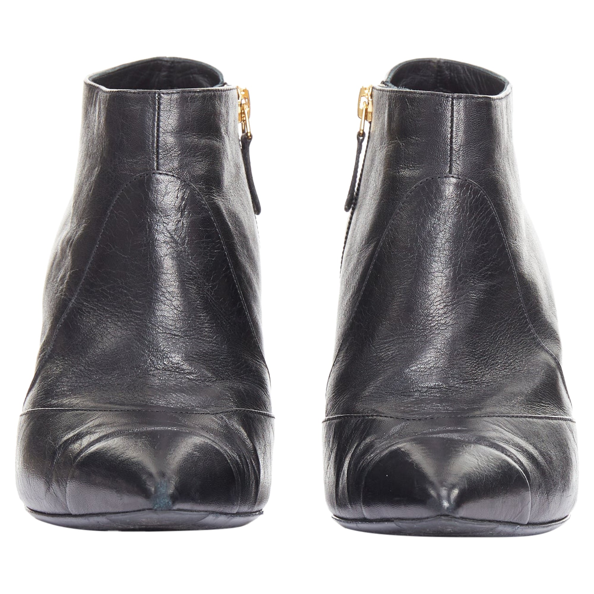 Women's Chanel black pearl ankle boots