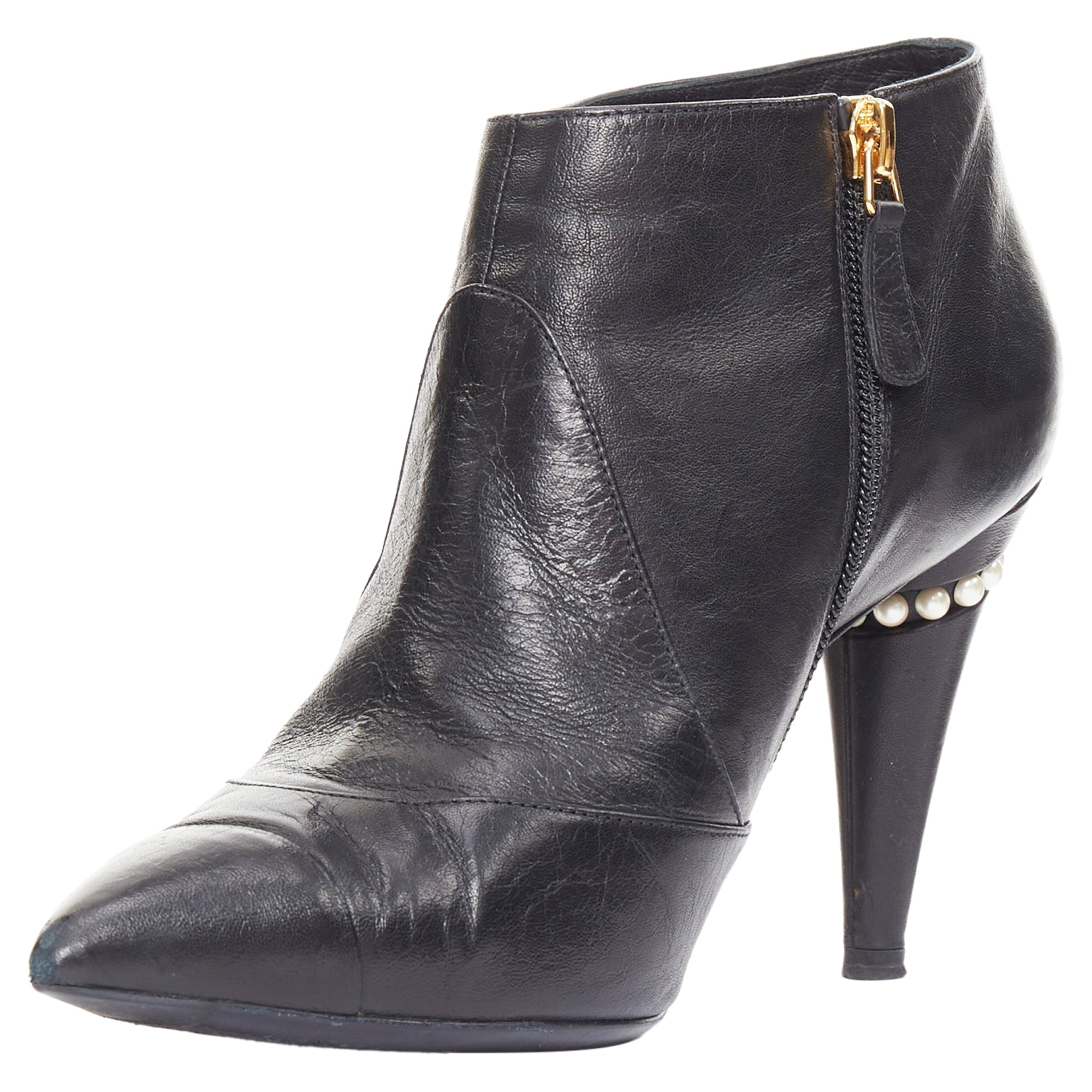 Women's Chanel black pearl ankle boots