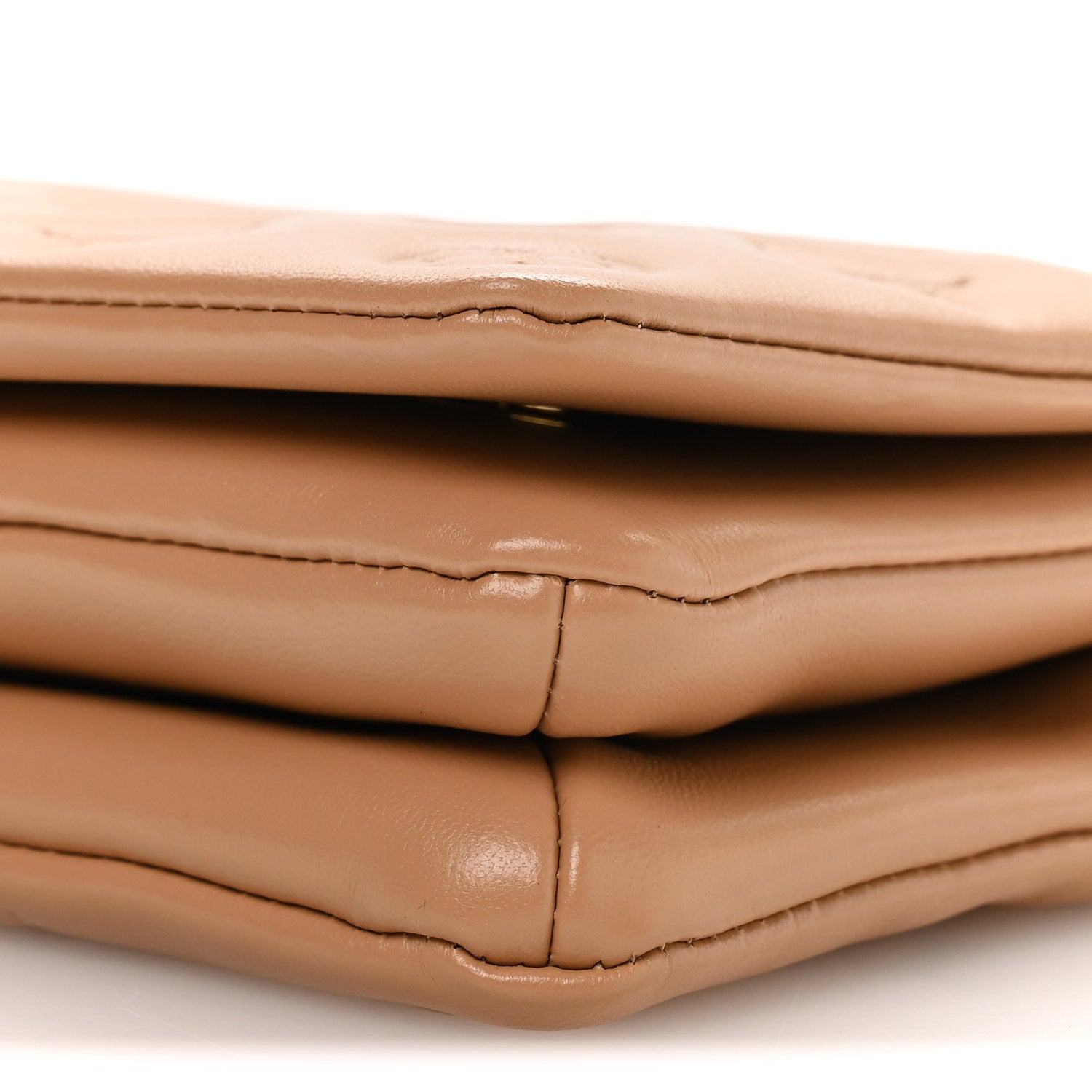 Lambskin Embossed Monogram Pochette Coussin Camel